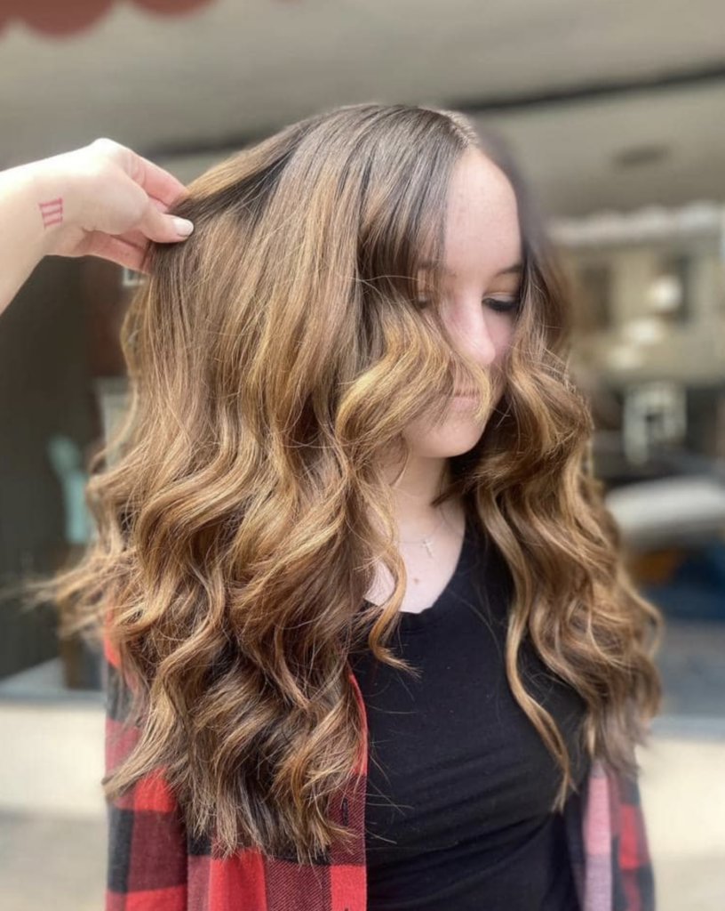 Long light brown curled hair